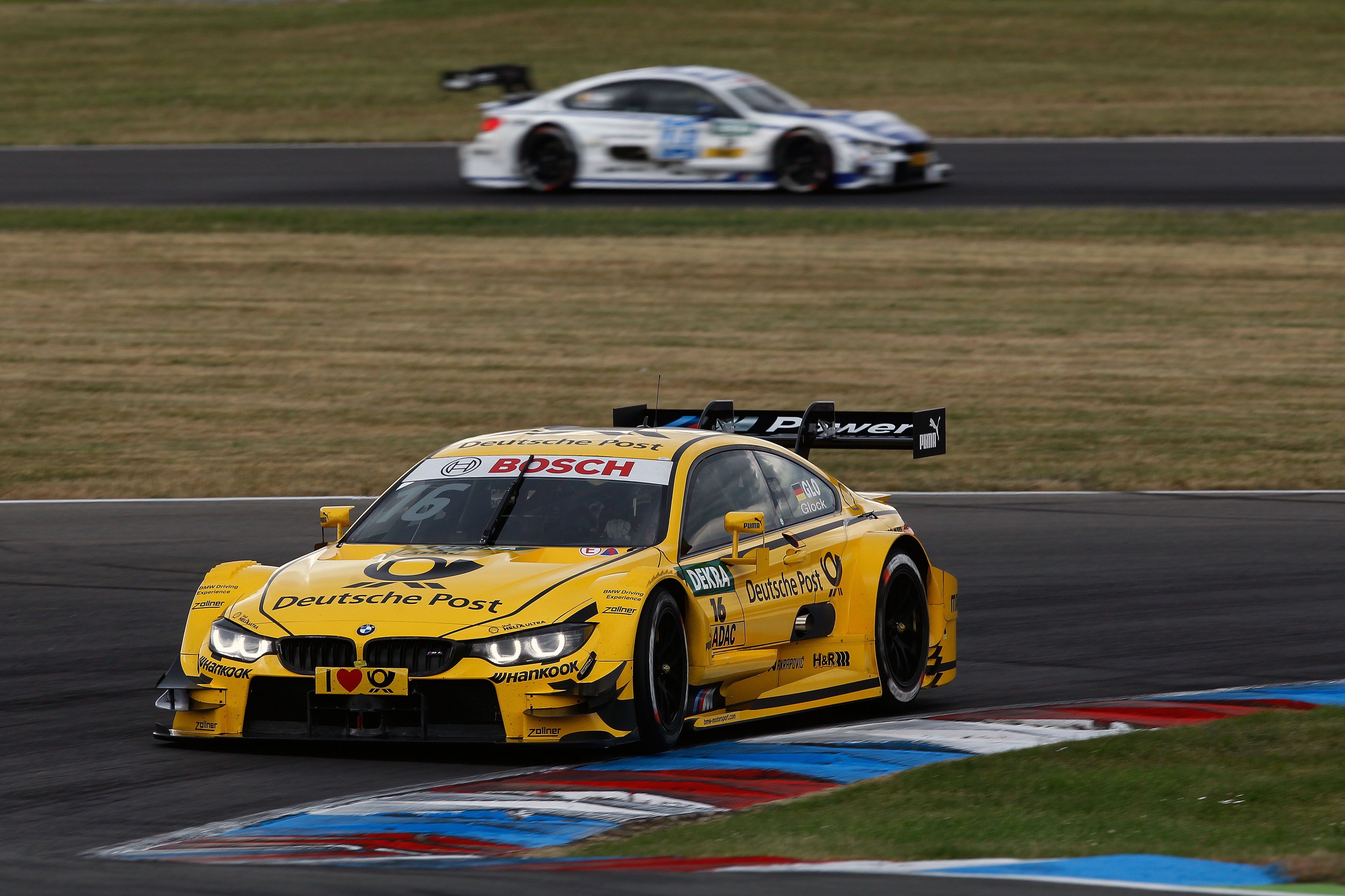 Lausitzring (DE) 29th May 2015. BMW Motorsport, Timo Glock (DE) DEUTSCHE POST BMW M4 DTM and Maxime Martin (BE) SAMSUNG BMW M4 DTM. This image is copyright free for editorial use © BMW AG (05/2015).
